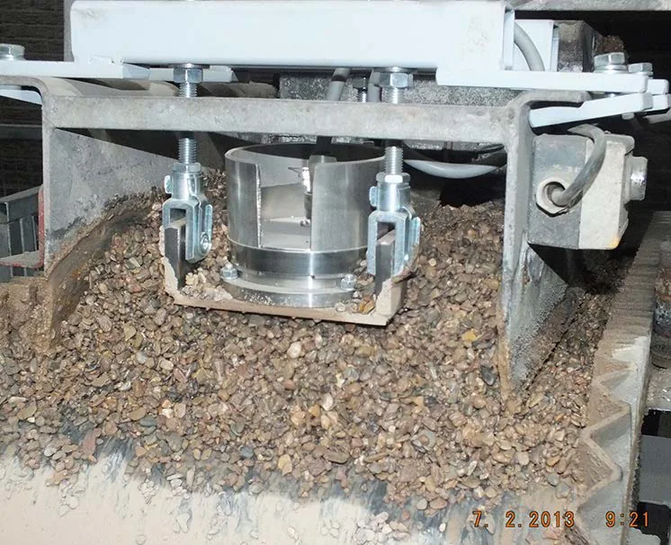 Conveyor position with material passing over the face