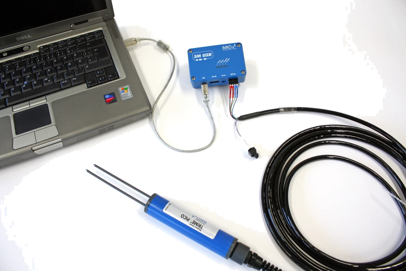 SM-USB converter connecting a TRIME moisture probe to a laptop for calibration and data logging
